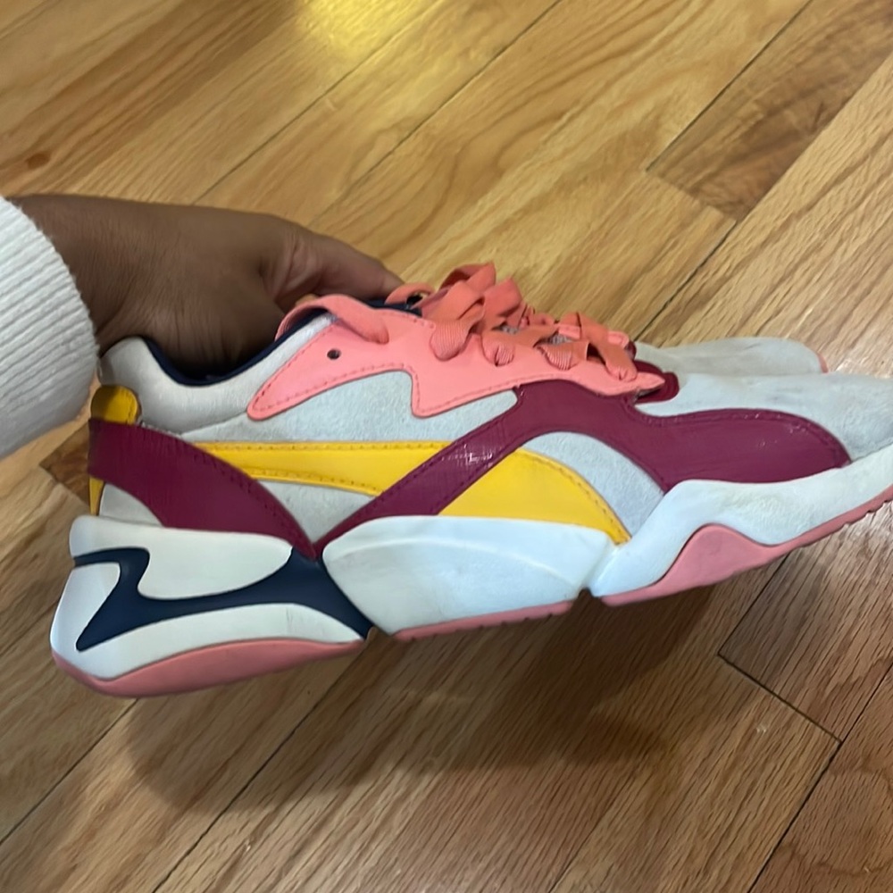 Pink yellow and blue pumas